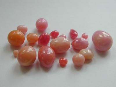 Conch Pearls Carat Weight. 39ct Shape. All shapes Size 13 x 9.5mm - smallest 3.3mm Color Pink to Orange
